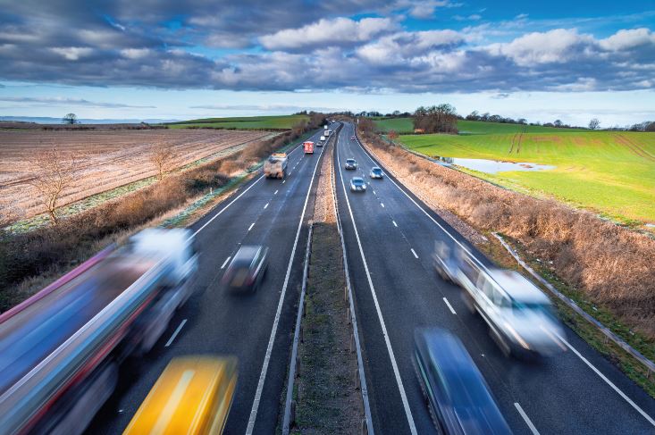 highway with speeding cars